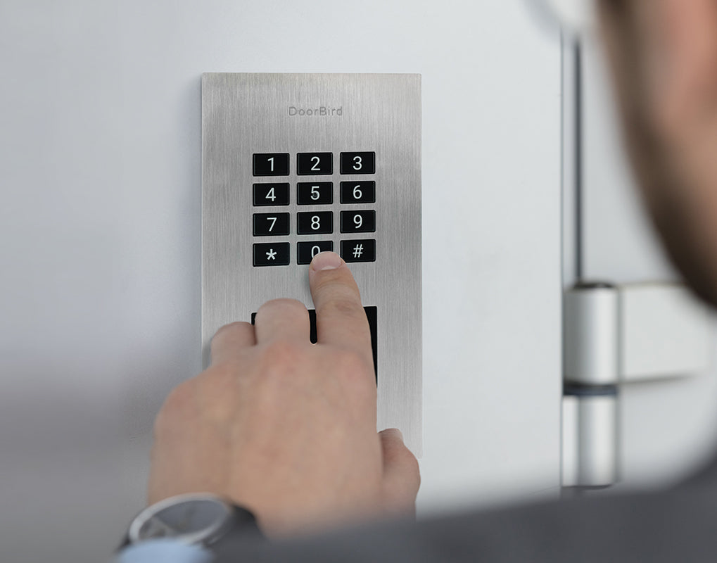 DoorBird stainless steel flush-mount keypad with finger press