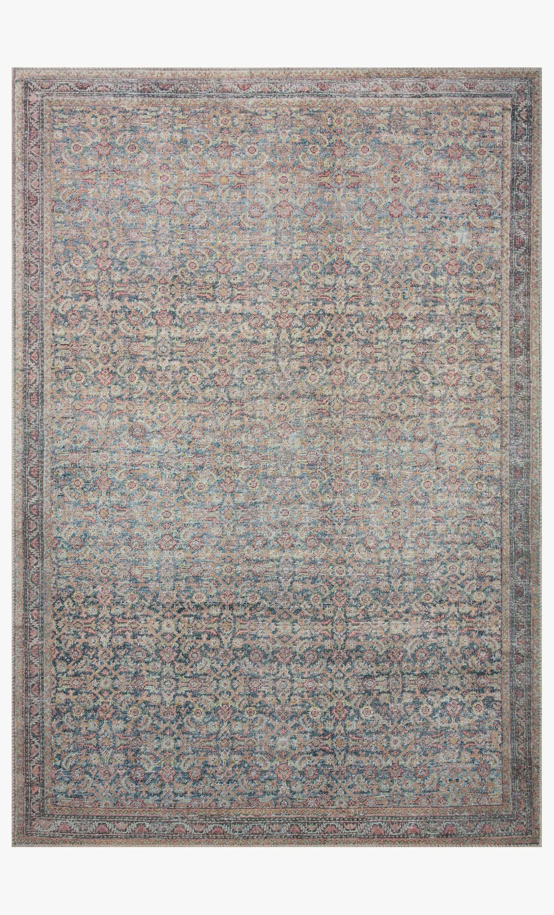 Denim blue traditional patterned area rug with multicolor distressed border