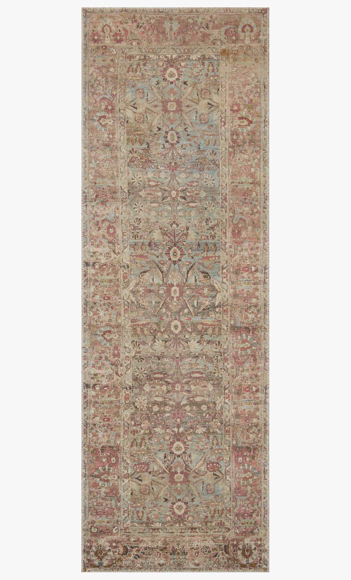 Ornate area rug with central medallion design in ocean and clay tones.