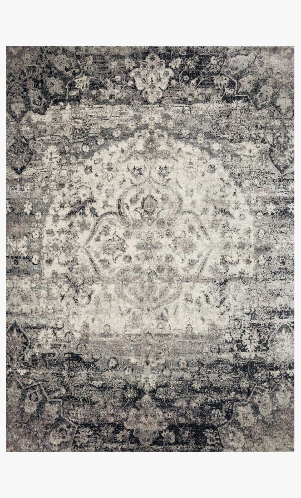 Transitional power-loomed rug with distressed ink-and-ivory medallion pattern and border