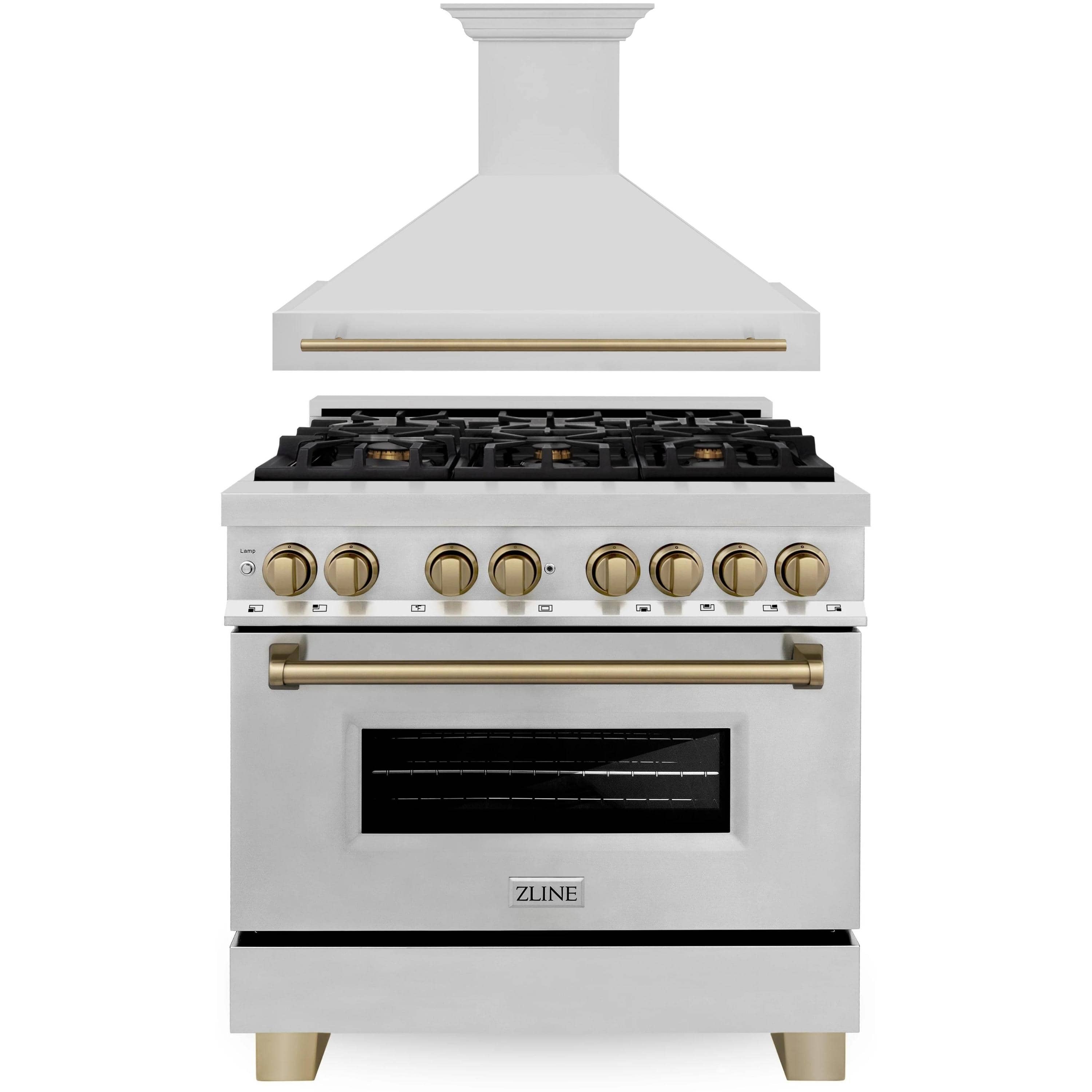 Stainless steel dual fuel range with champagne bronze trim and wall hood, front view