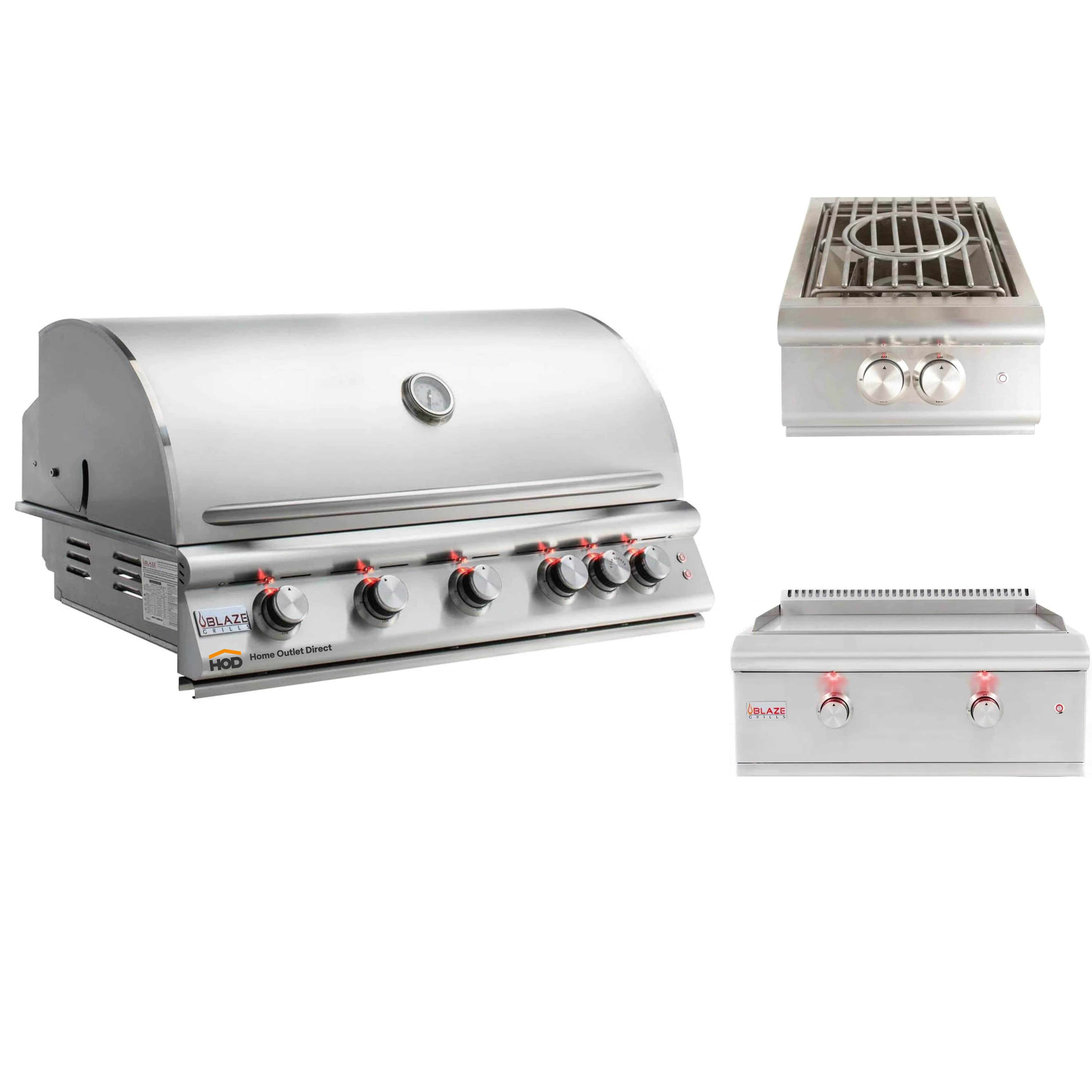 Stainless steel built-in grill with control knobs and a separate side burner griddle