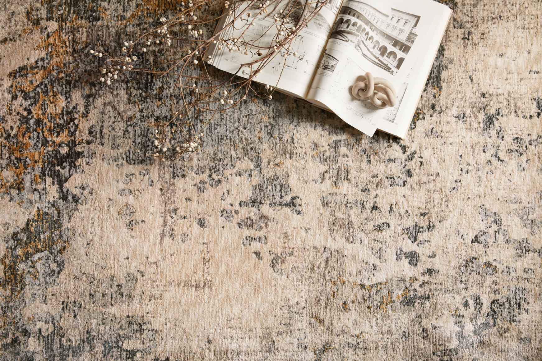 Ocean blue and beige rug close-up with textured, speckled abstract weave