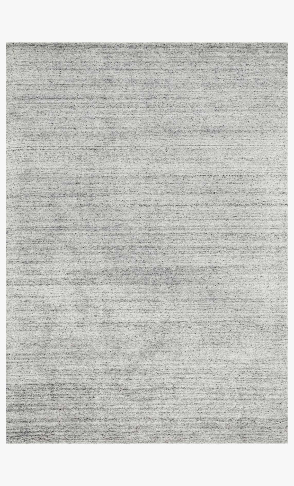 Silver hand-loomed area rug with subtle linear stripe texture, full view.