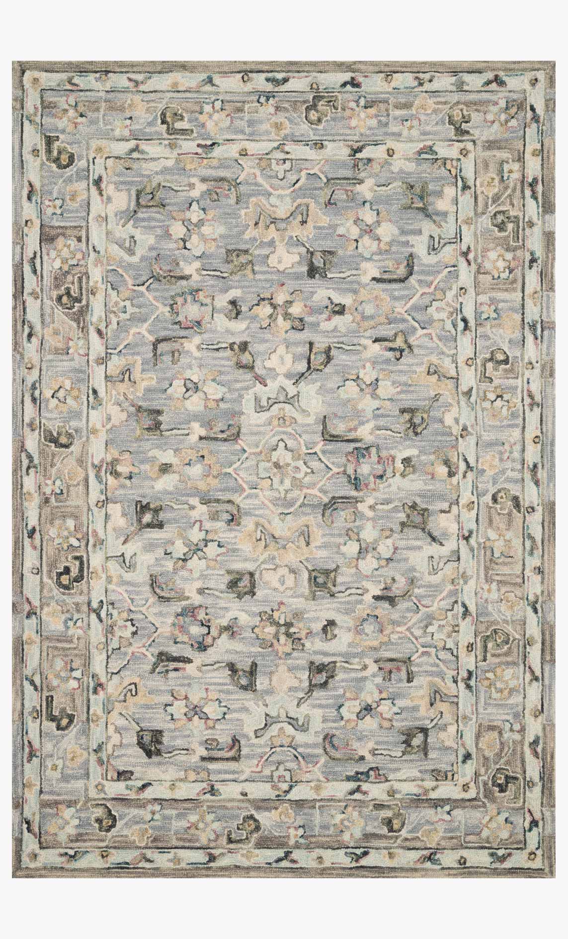 Traditional hooked rug with light blue base and ornate border pattern, rectangular