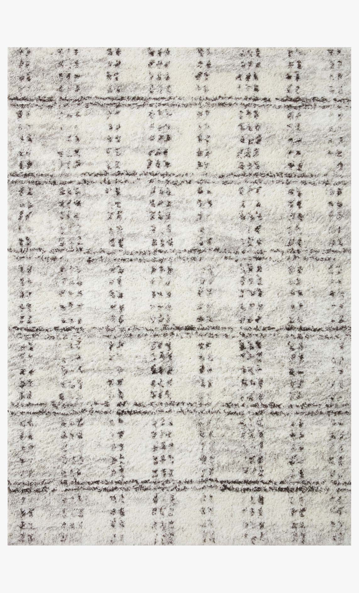 Cream and grey shag rug with textured distressed grid pattern, power-loomed.