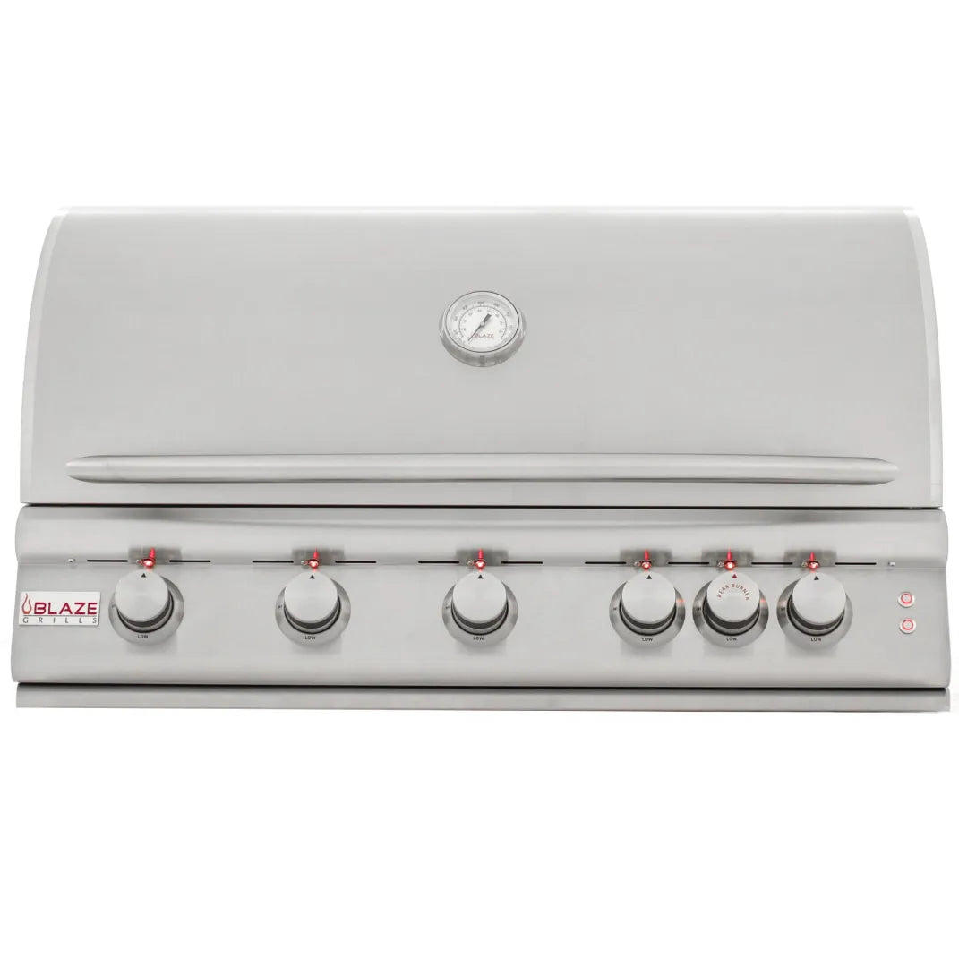 Stainless propane grill with lid closed, temperature gauge, and 6 control knobs
