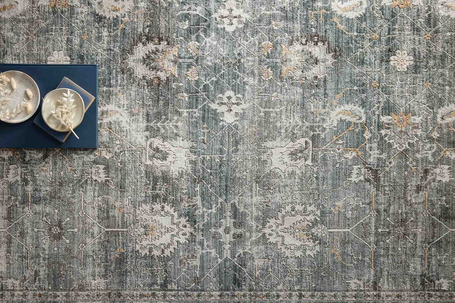 Lagoon and ivory rug with dense distressed geometric pattern, vertical panel effect