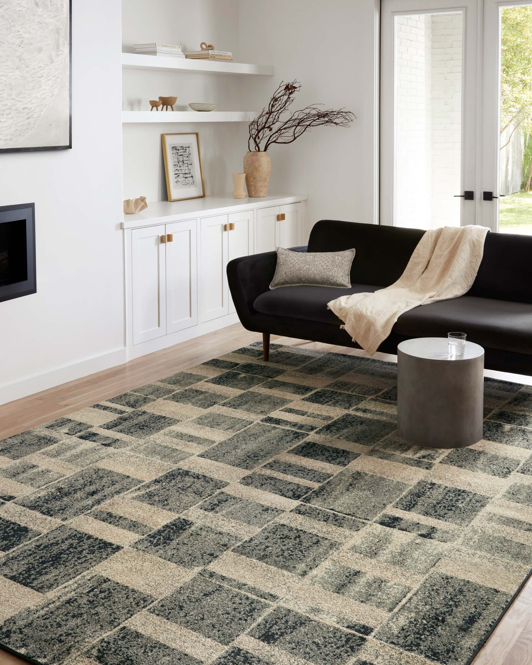 Geometric area rug with distressed square grid pattern in dark gray and light sand