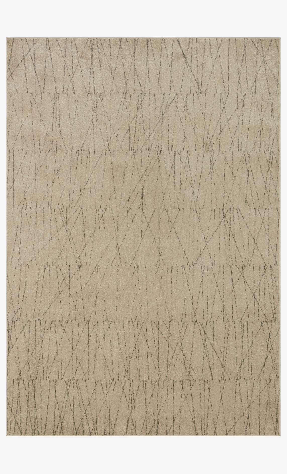 Beige area rug with peppered abstract line pattern and flat woven texture