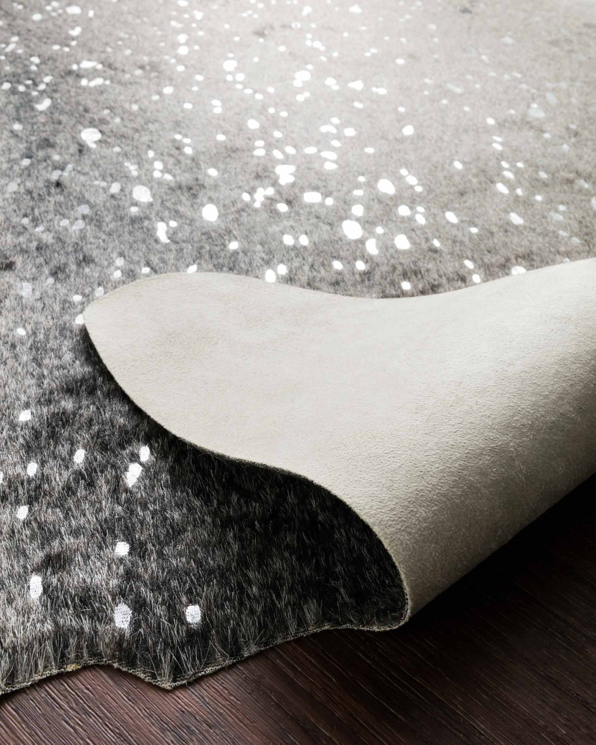 Silver speckled graphite rug detail with plush pile texture close-up