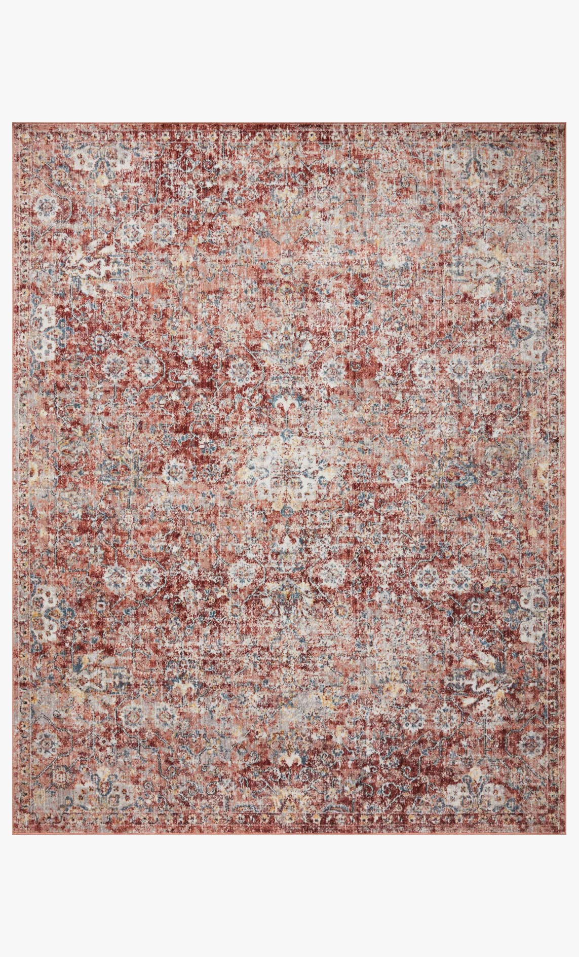 Traditional power loomed rug with rust, ivory, and multicolor abstract medallion pattern.