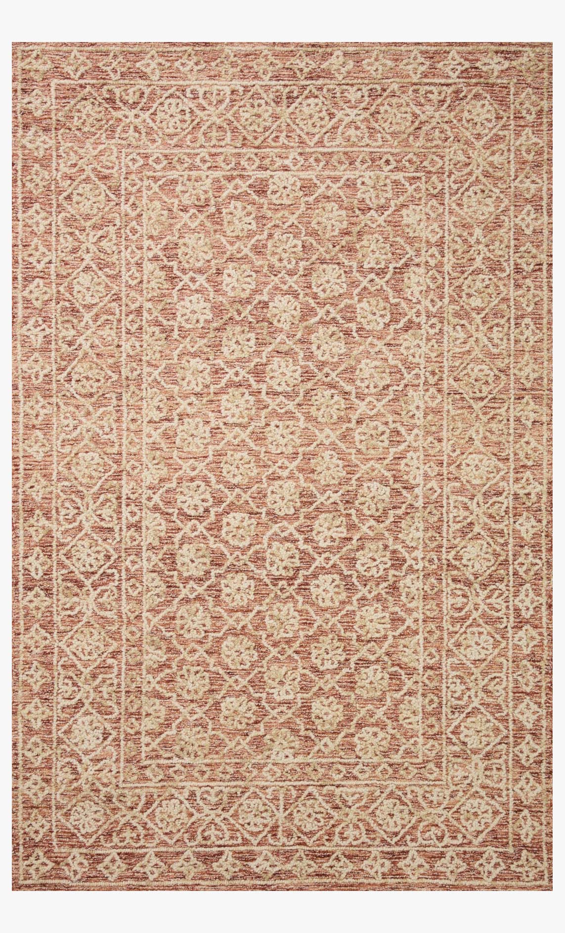 Rust and natural hand-tufted rug with ornate geometric border and central medallion