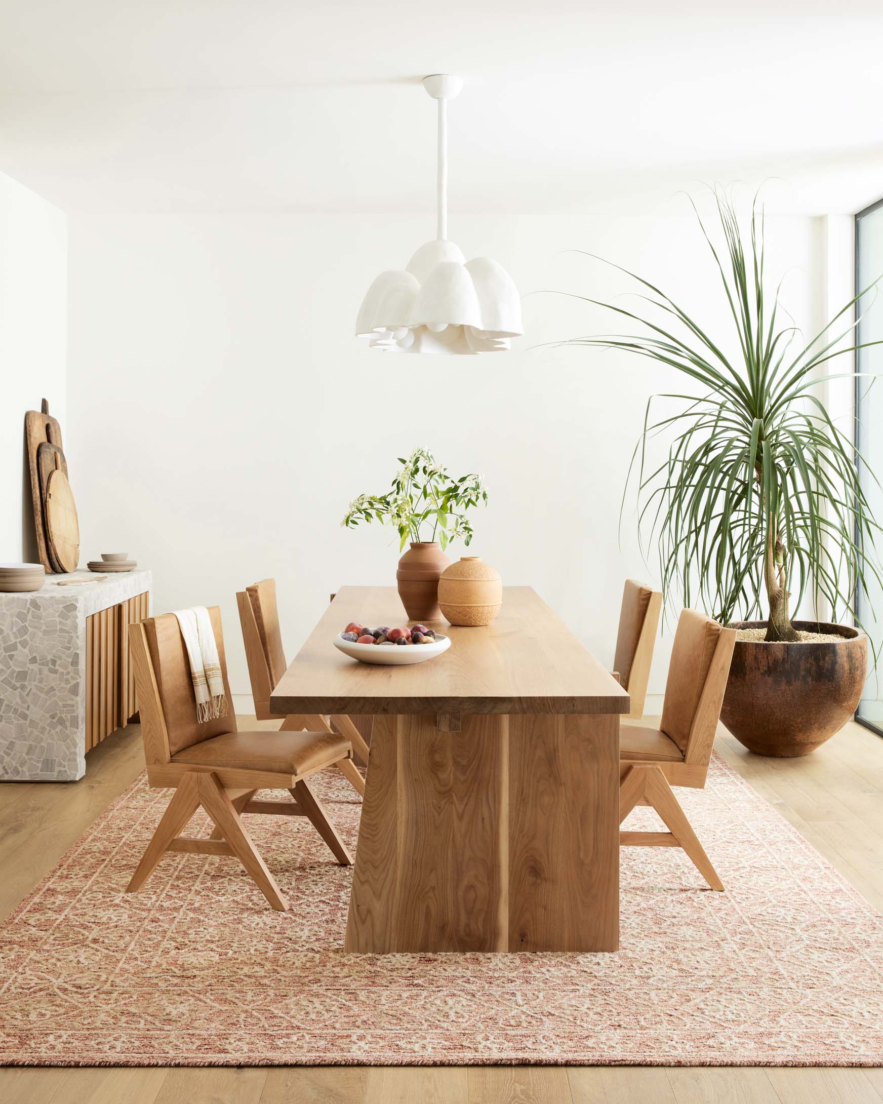 Rust and natural patterned hand-tufted rug with detailed geometric motif