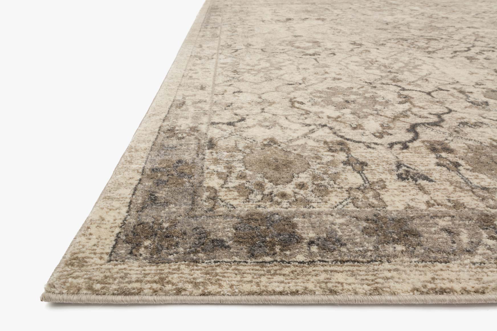 Loloi Century transitional power-loomed rug in sand with distressed medallion pattern