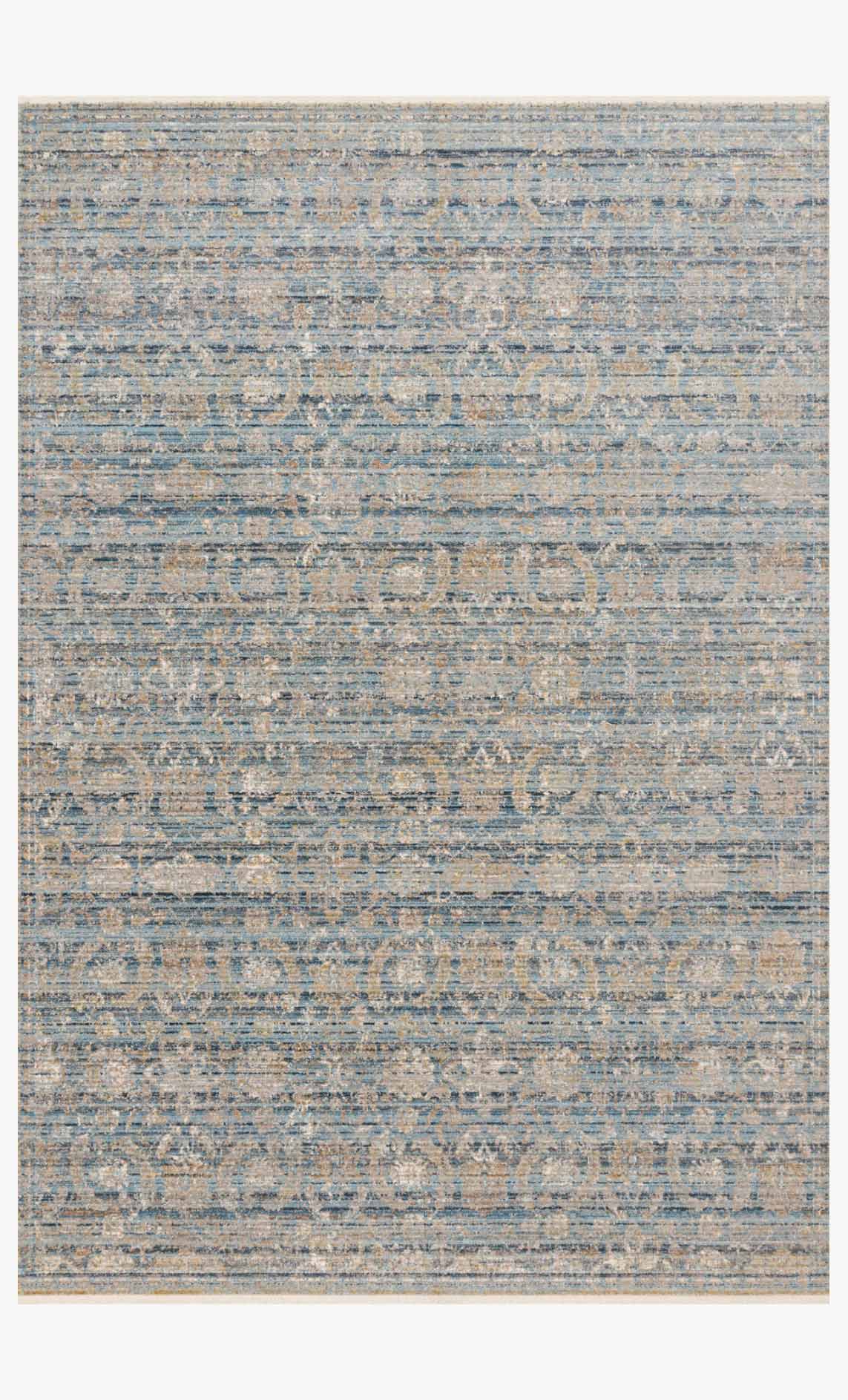 Traditional power-loomed rug with ocean blue, gold, and beige abstract distressed pattern