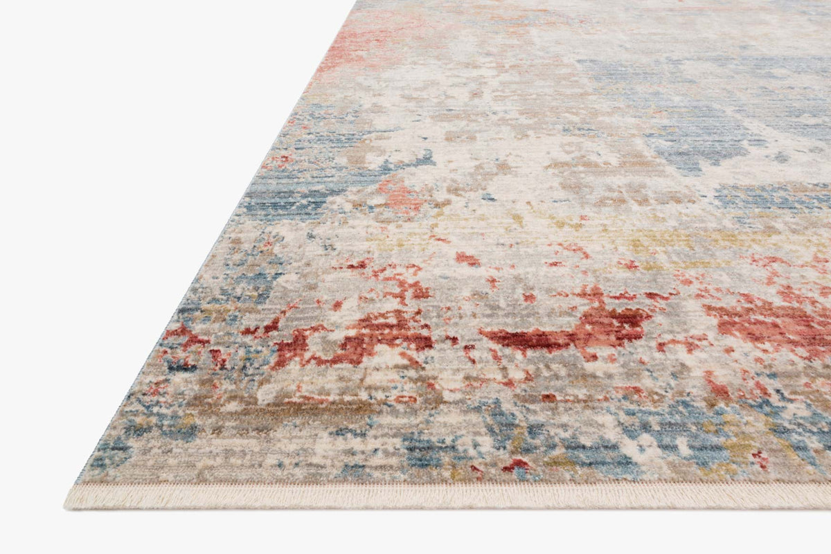 Corner view of traditional power-loomed rug with distressed abstract pattern in grey tones