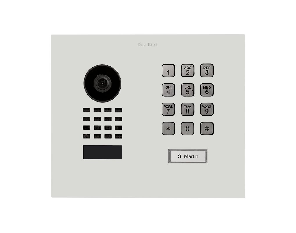 DoorBird flush-mount IP video door station, white panel with call keypad and nameplate