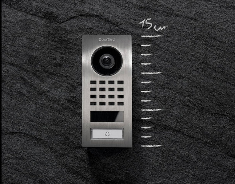 Stainless steel video intercom with camera, keypad grid, and call button; size marked