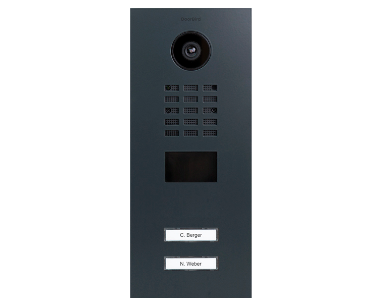 Anthracite grey door station face with camera lens, keypad grid, and two labeled call buttons