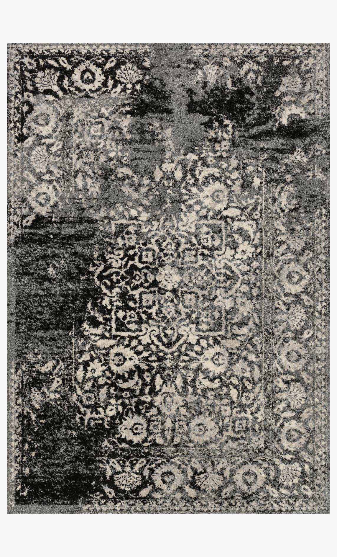 Black and ivory transitional power-loomed rug with ornate distressed medallion pattern