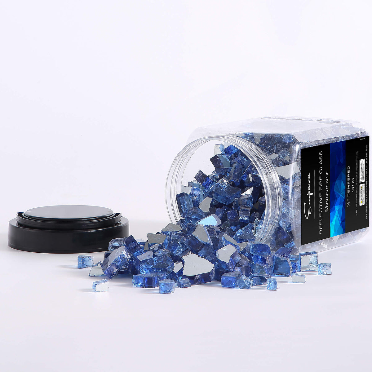 Blue fire glass crystals next to clear jar and black-lidded canister, side angle