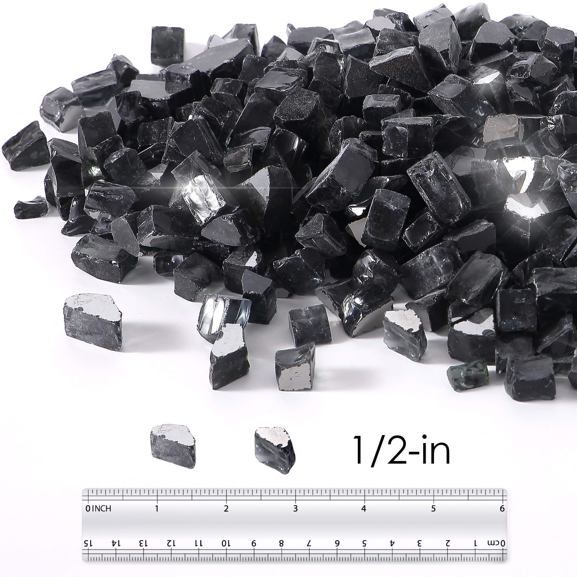Black reflective tempered fire glass chunks with ruler showing 1/2-in size