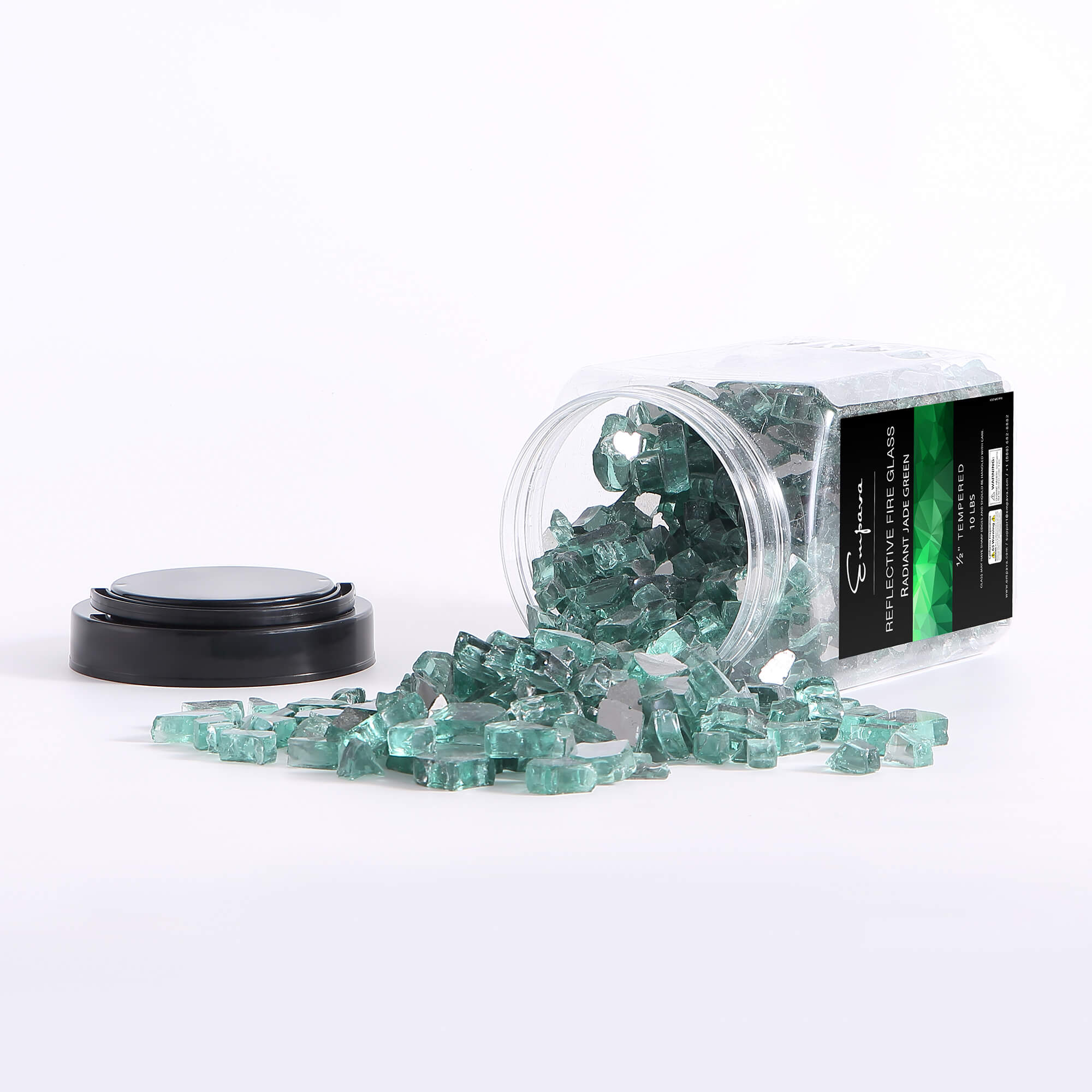 Jade green tempered fire glass with open jar and scattered reflective glass chunks