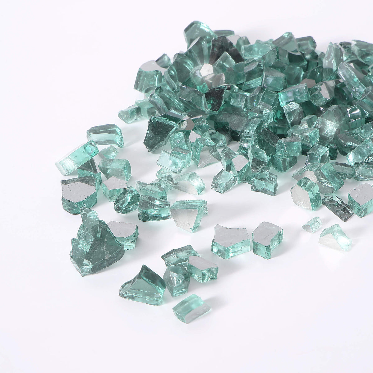 Jade green tempered reflective fire glass pieces in a loose pile