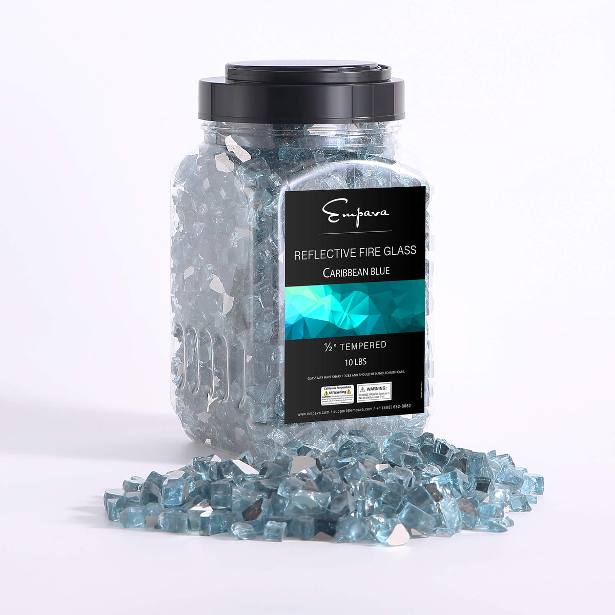 Jar of tempered reflective fire glass in Caribbean blue, with loose glass pieces around