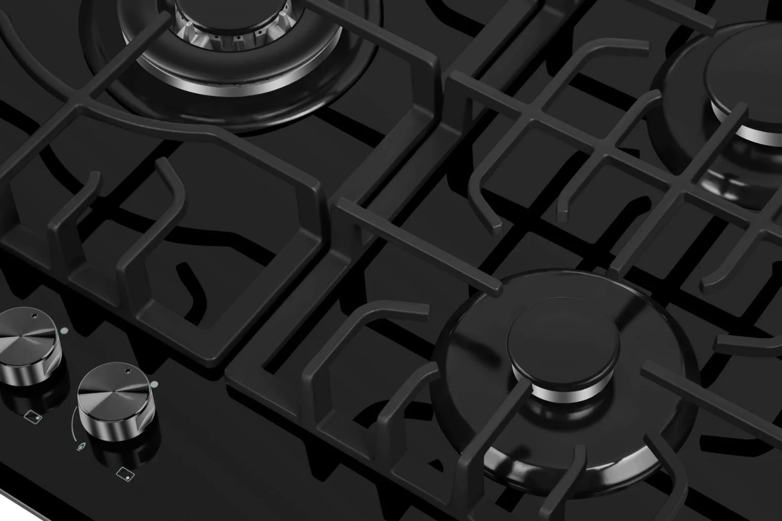 Black built-in natural gas cooktop close-up of burner caps, grates, and knobs
