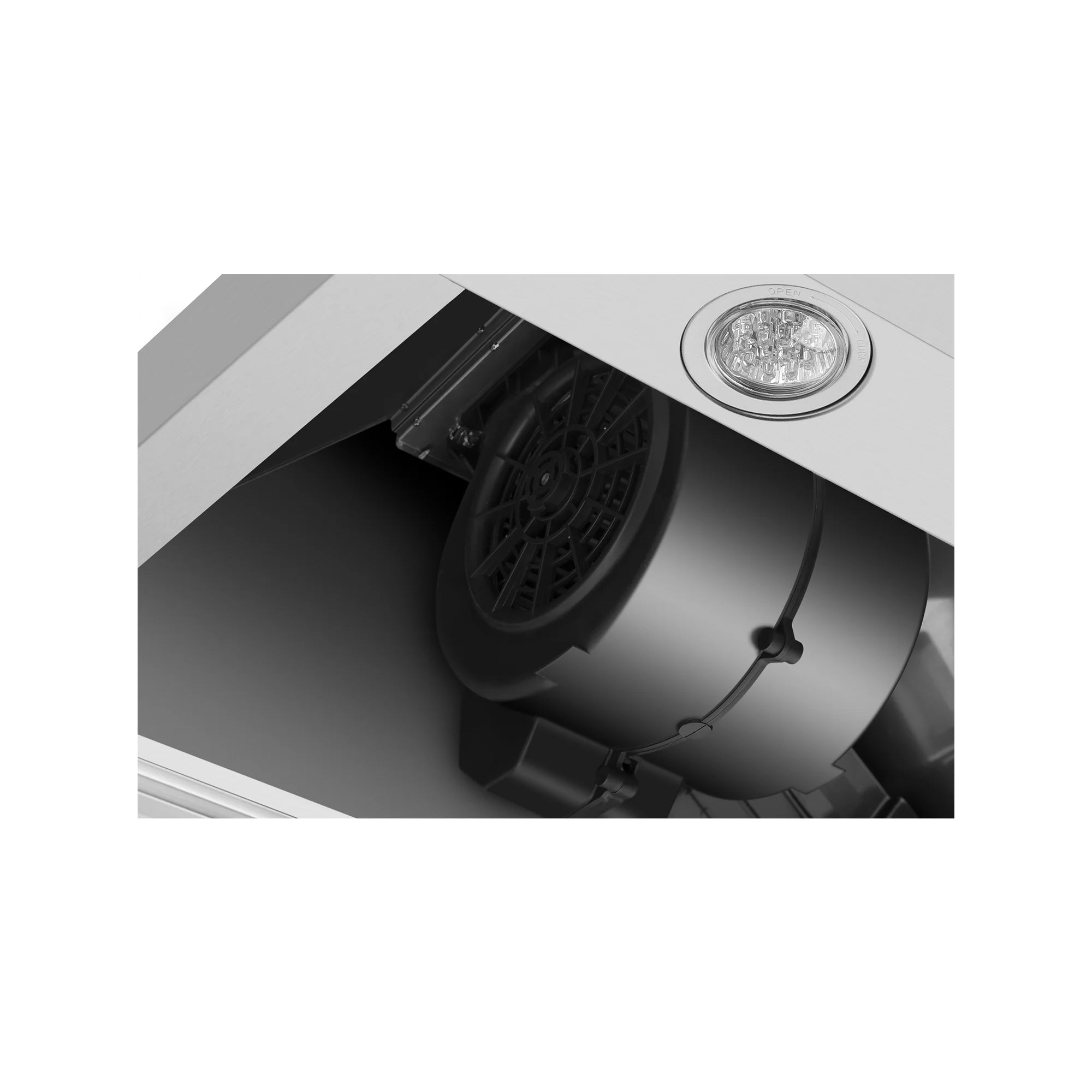 Range hood interior view showing fan housing and wiring through the vent