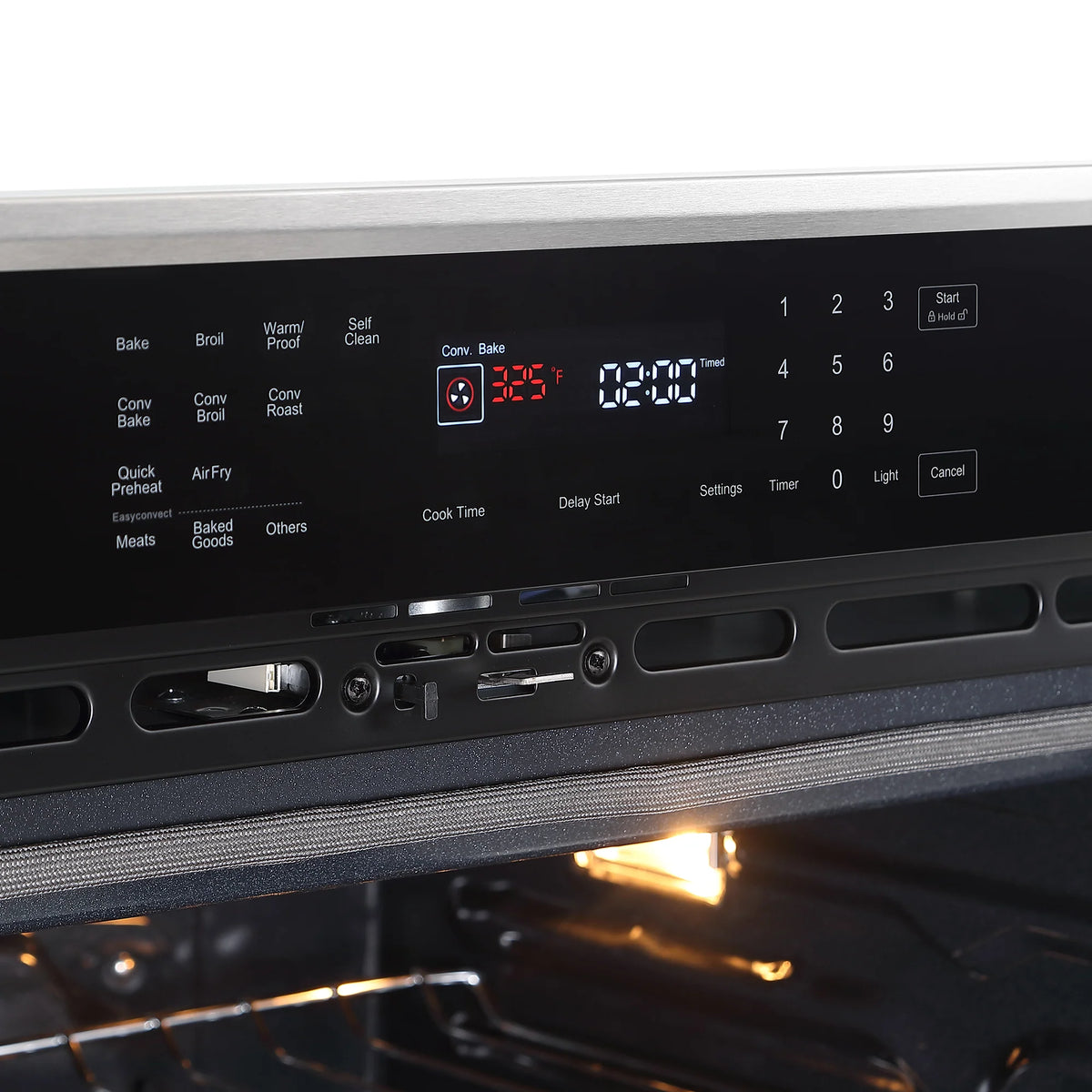 Black oven control panel with backlit buttons, timer numbers, and open-door opening