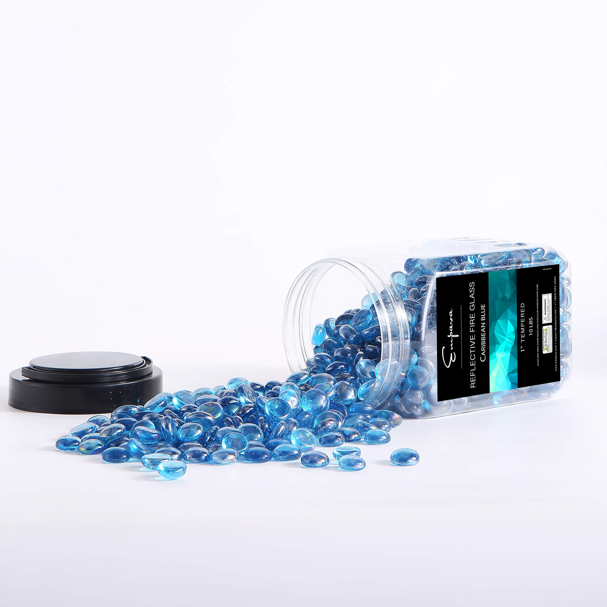 Caribbean blue tempered fire glass beads scattered with clear canister and lid