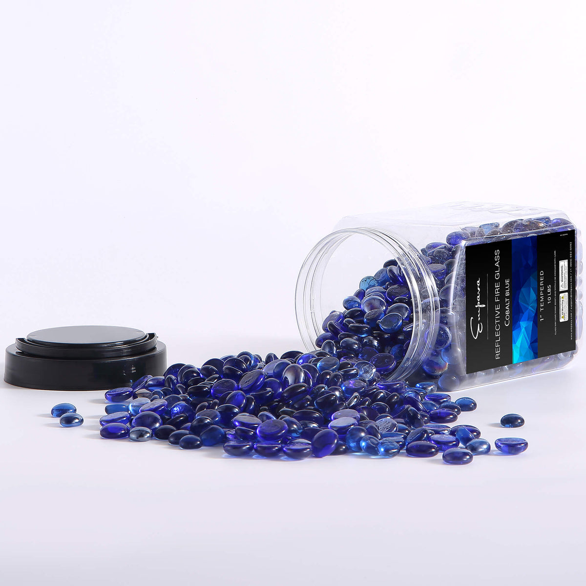 Tempered fire glass beads, cobalt blue in an open jar with loose beads on surface