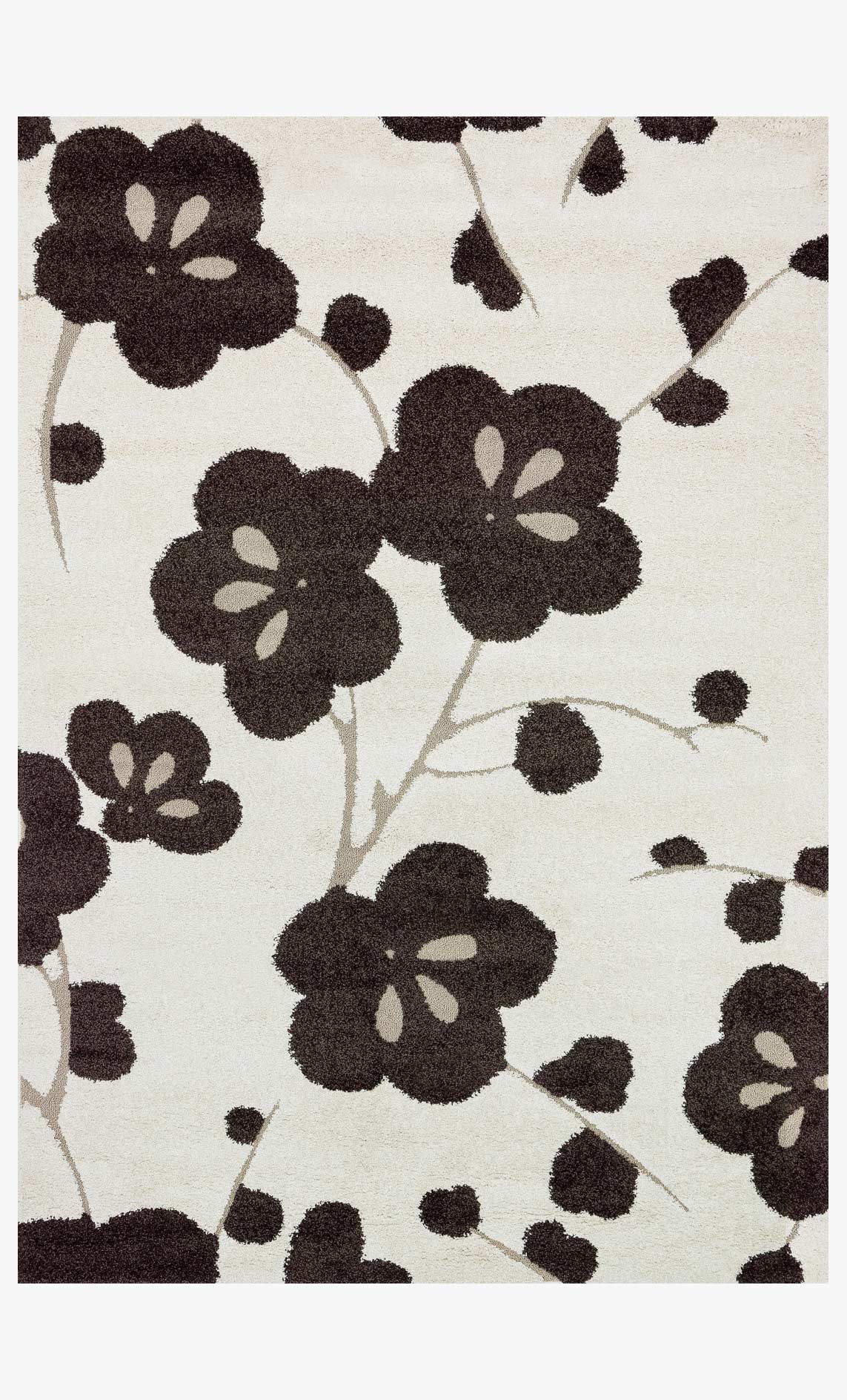 Ivory rug with dark brown floral motif and scattered heart-like shapes