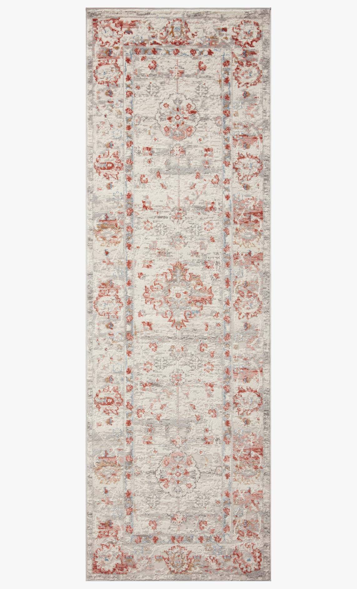 Ivory rug with rust and blue ornate border and centered medallion