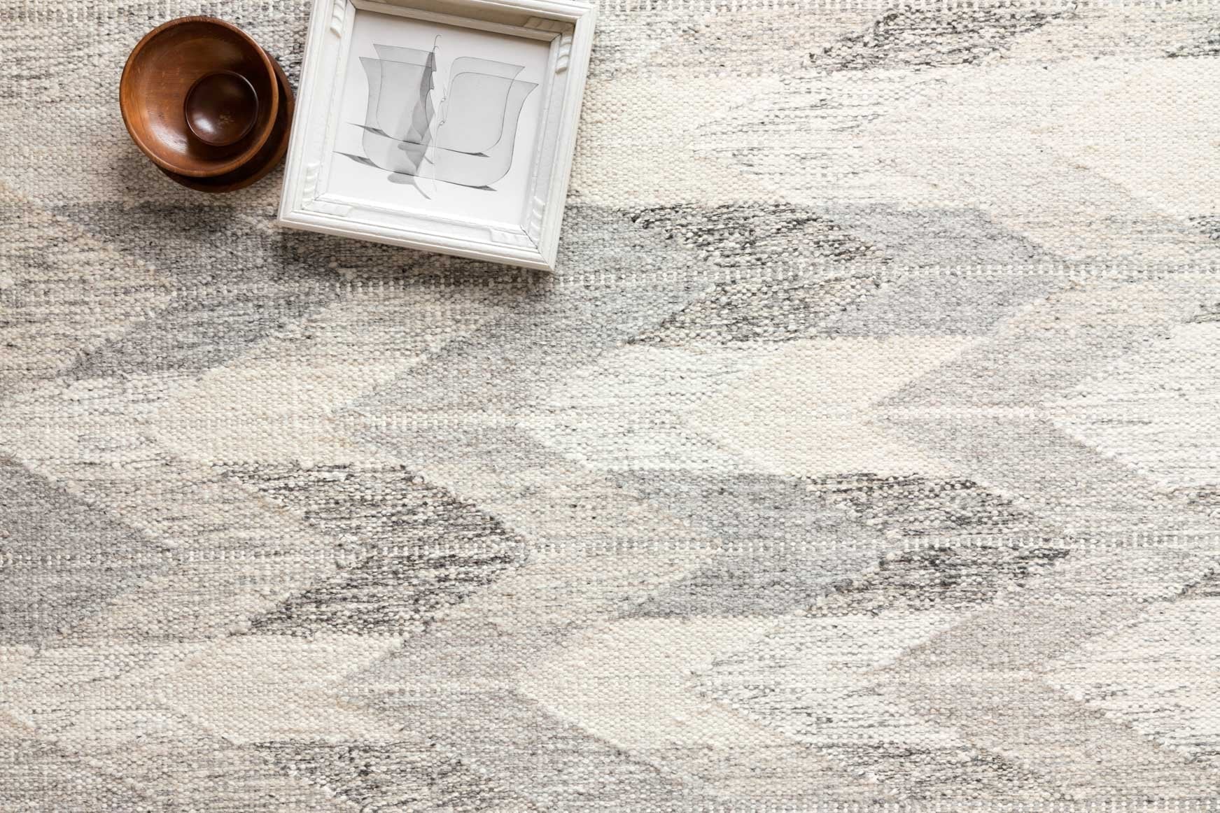 Contemporary hand-woven rug with light gray pewter abstract pattern, textured weave