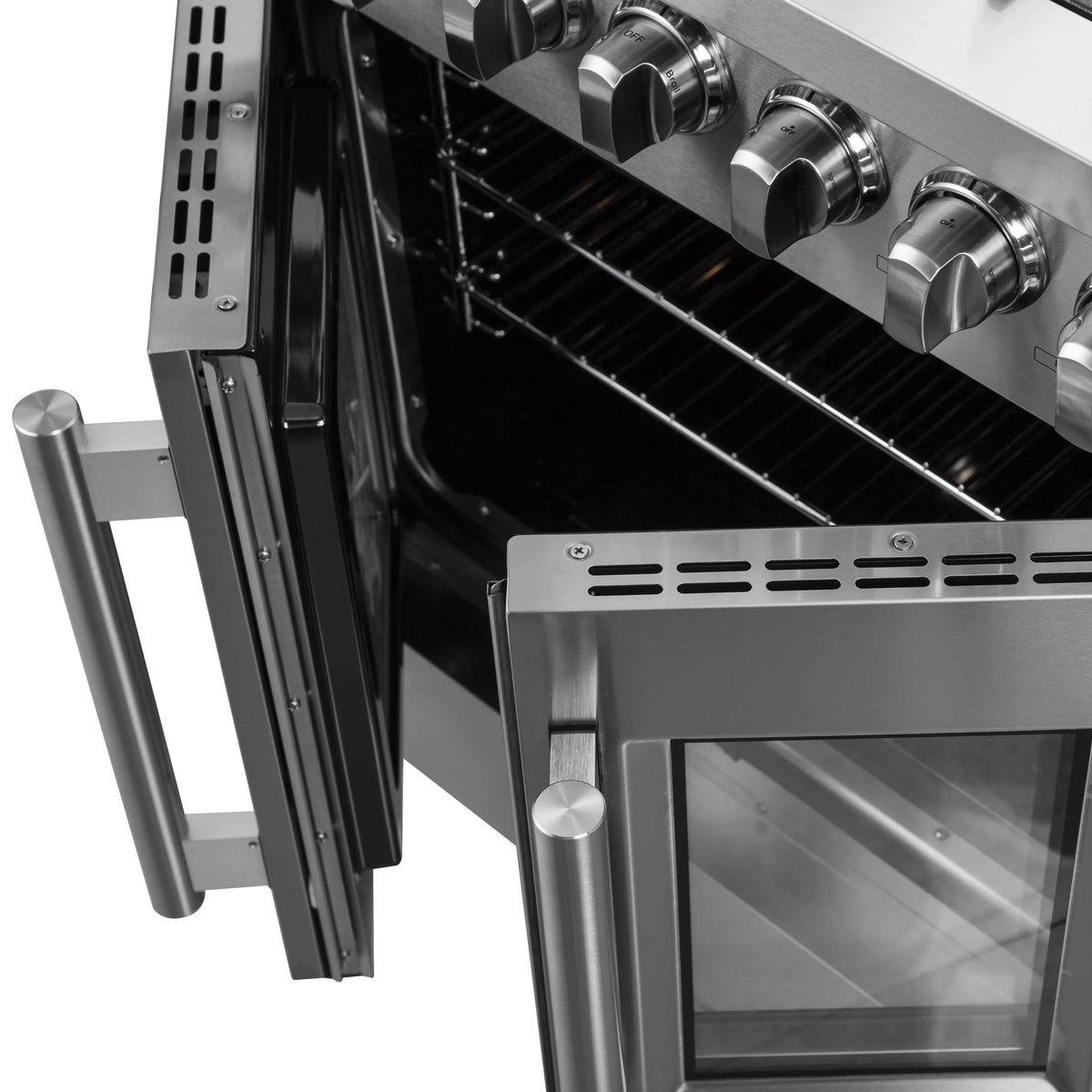 Stainless steel oven door open with interior racks and control knobs above