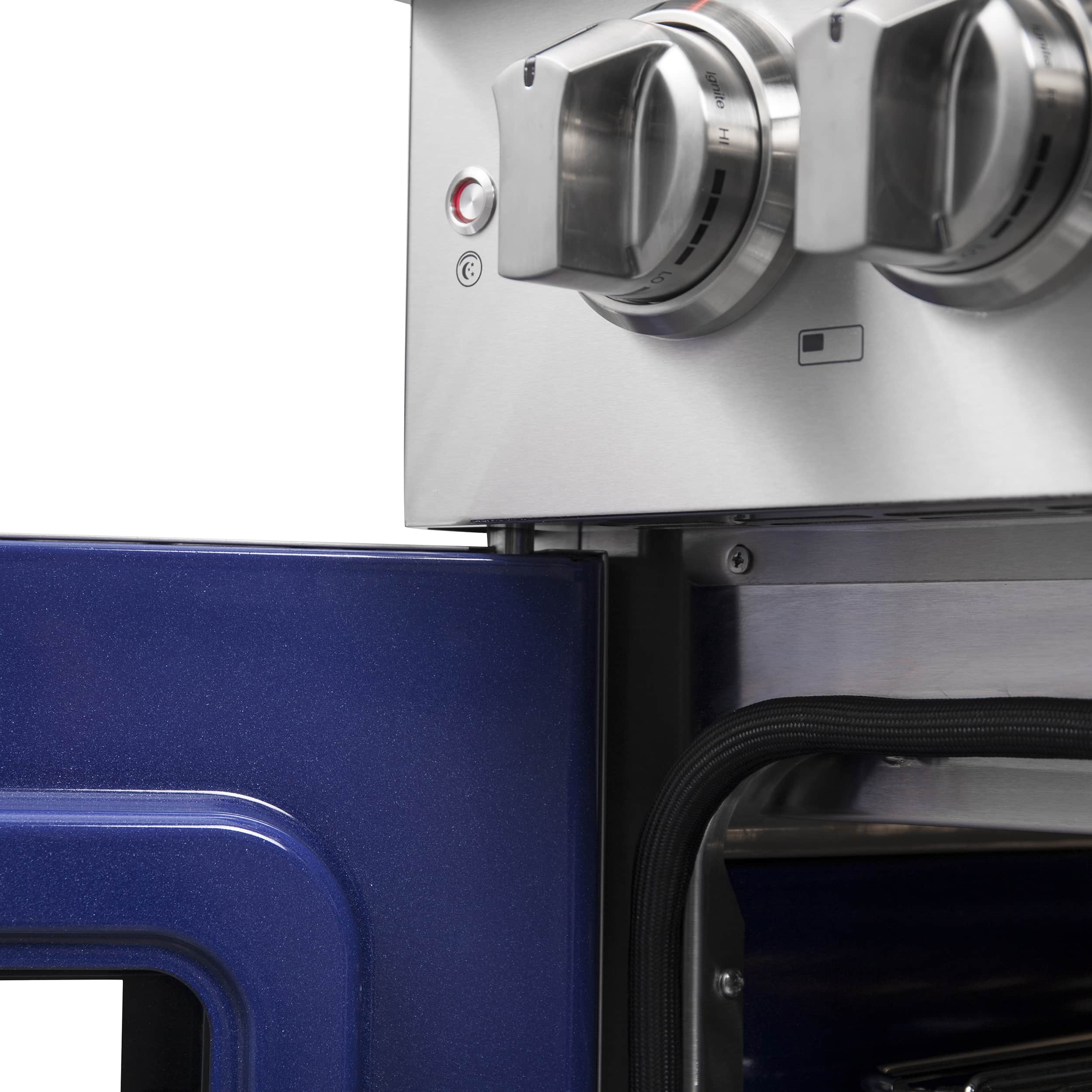 Stainless steel control area with round knobs and blue oven trim