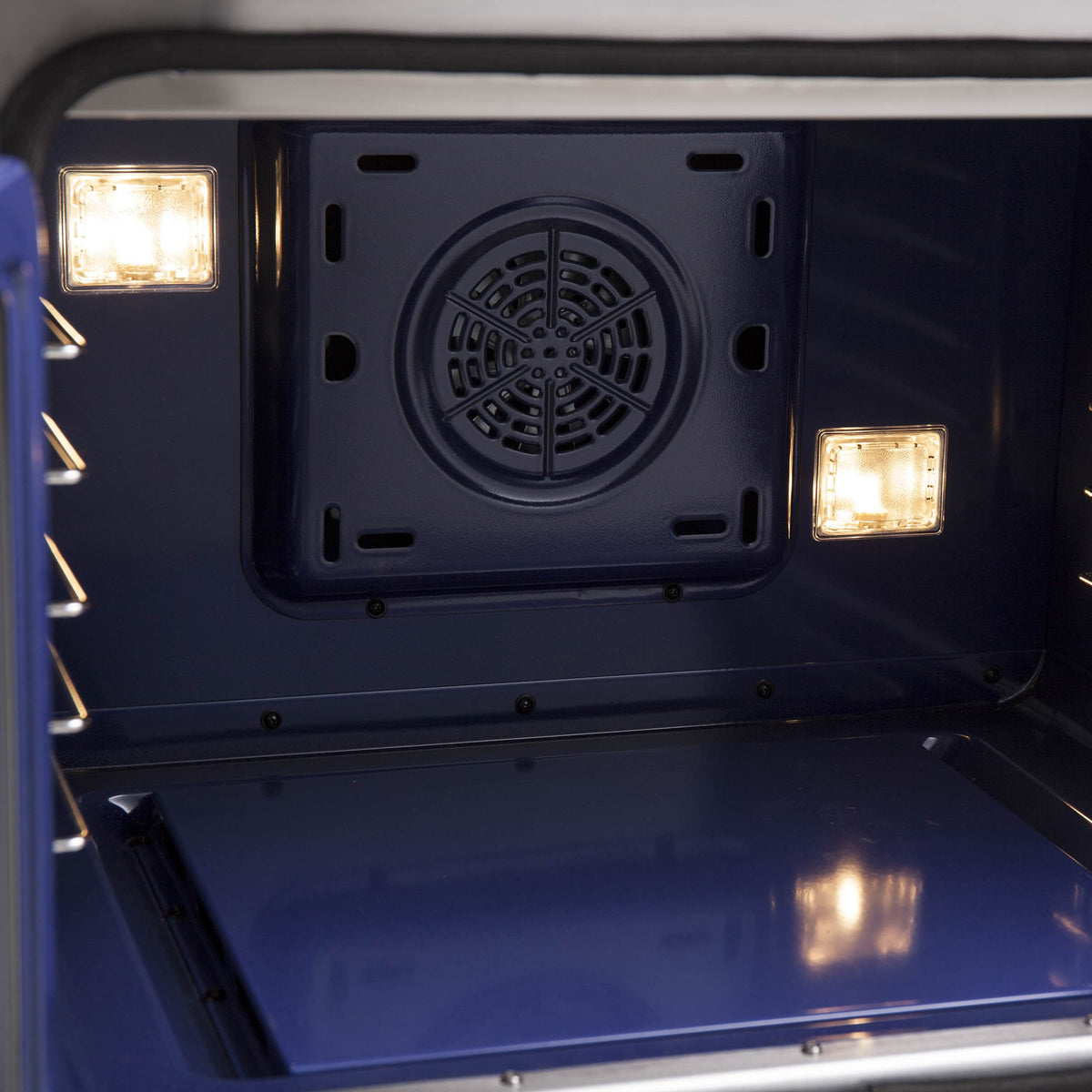 Blue oven interior with rear vent fan and two interior lights