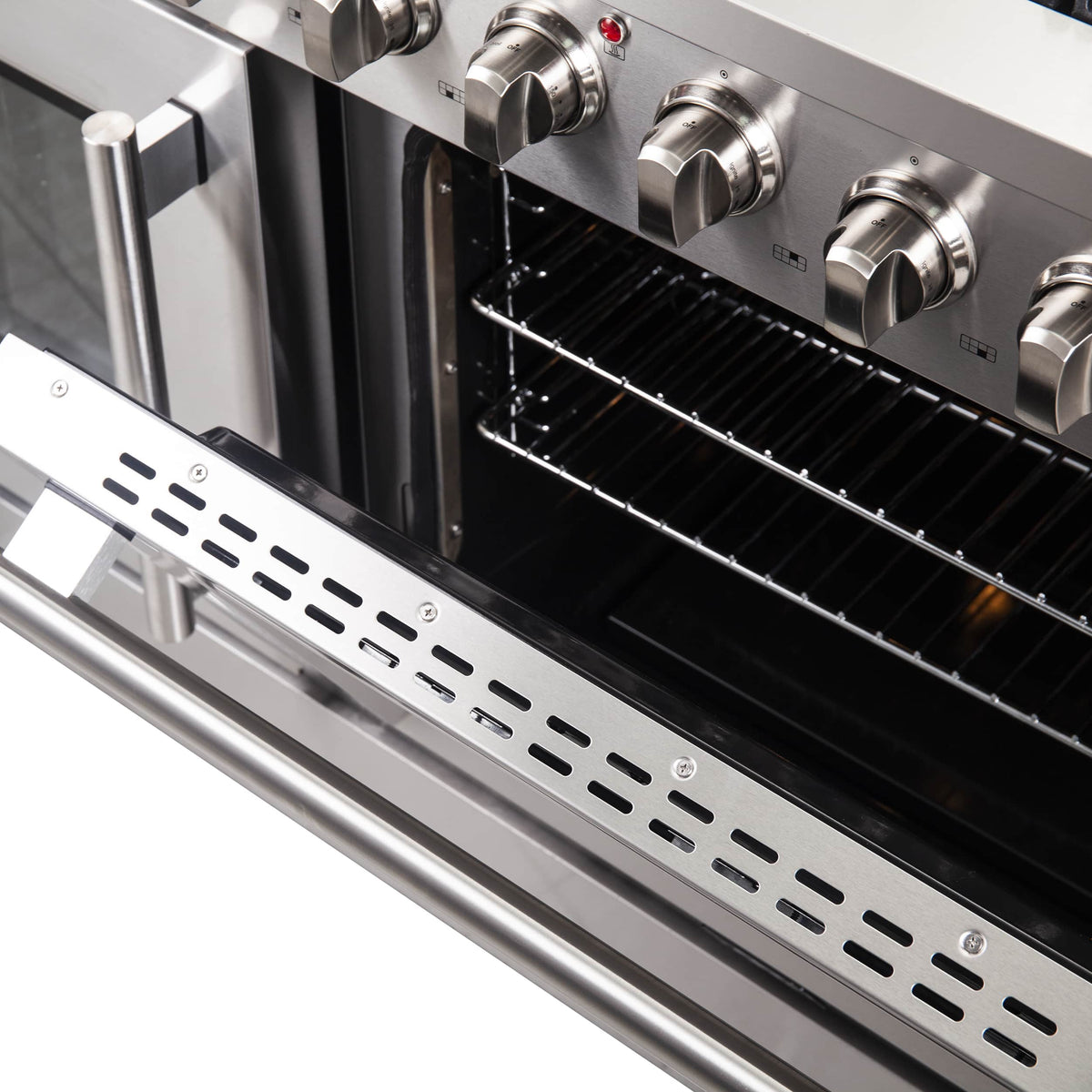 Stainless steel oven interior with wire rack and vented lower panel