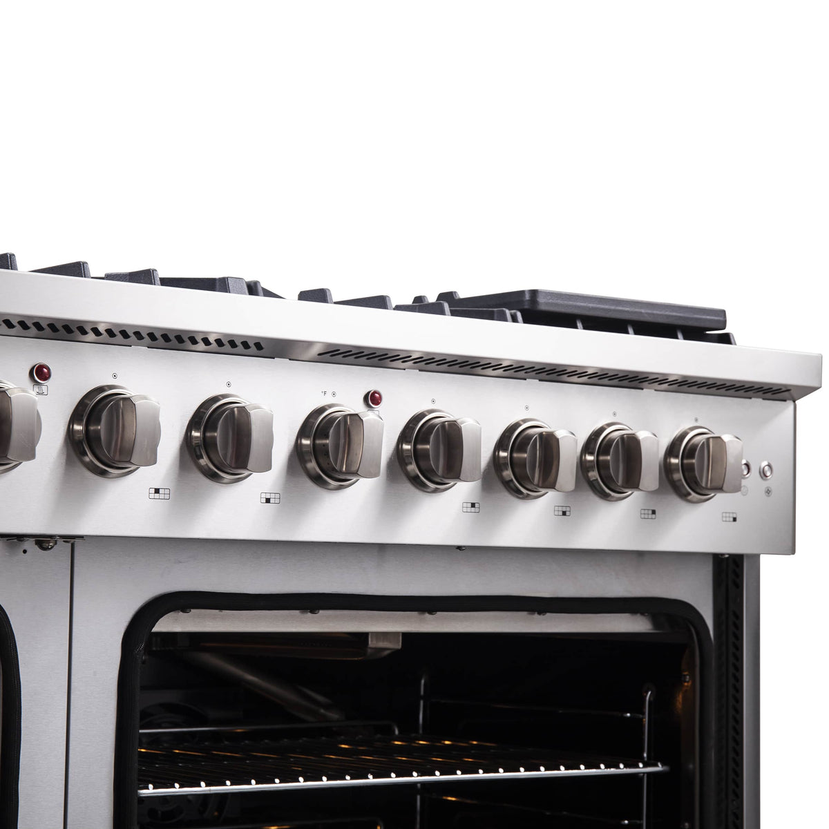 Stainless steel control panel with round knobs and open oven cavity
