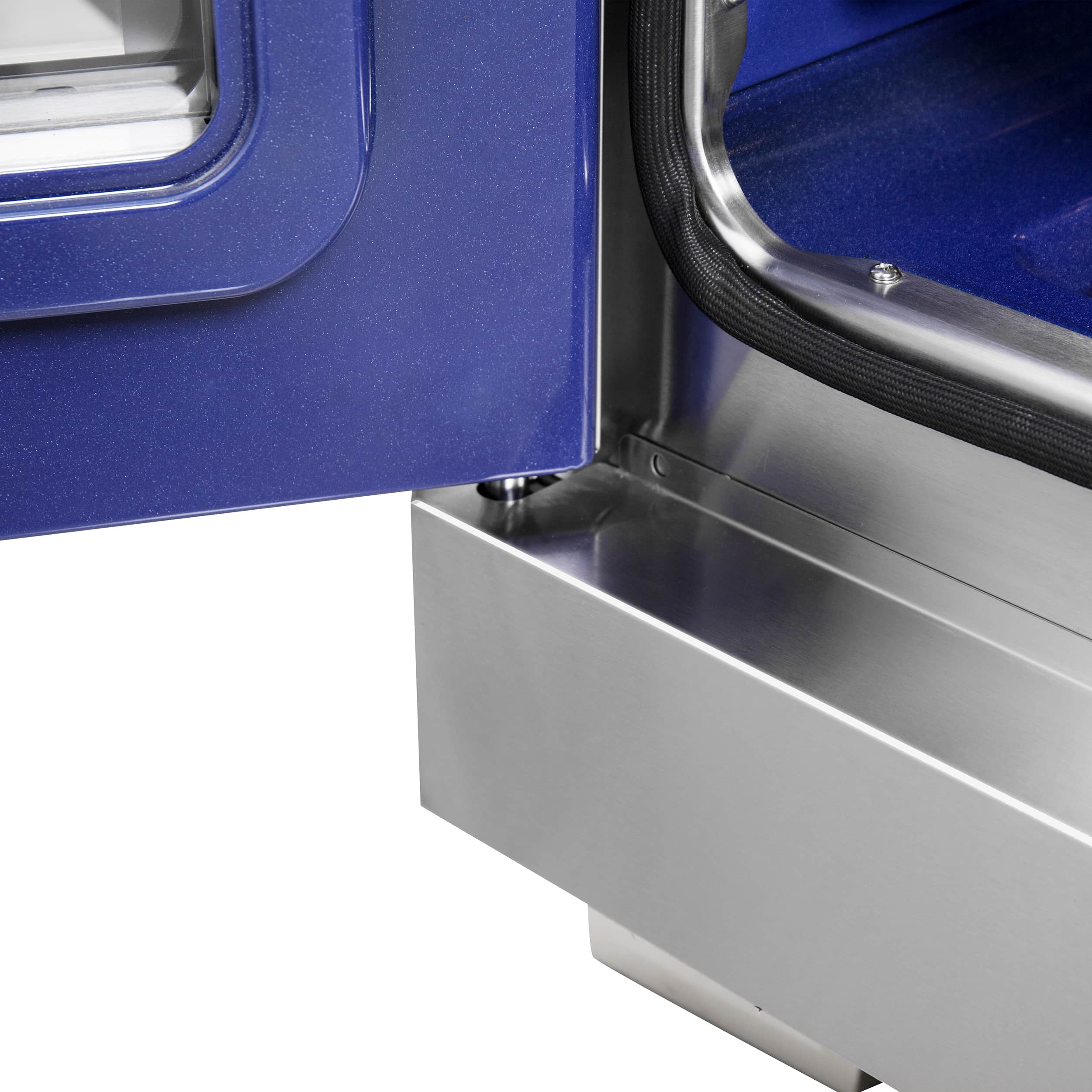 Stainless steel gas range side panel with blue burner housing and control area