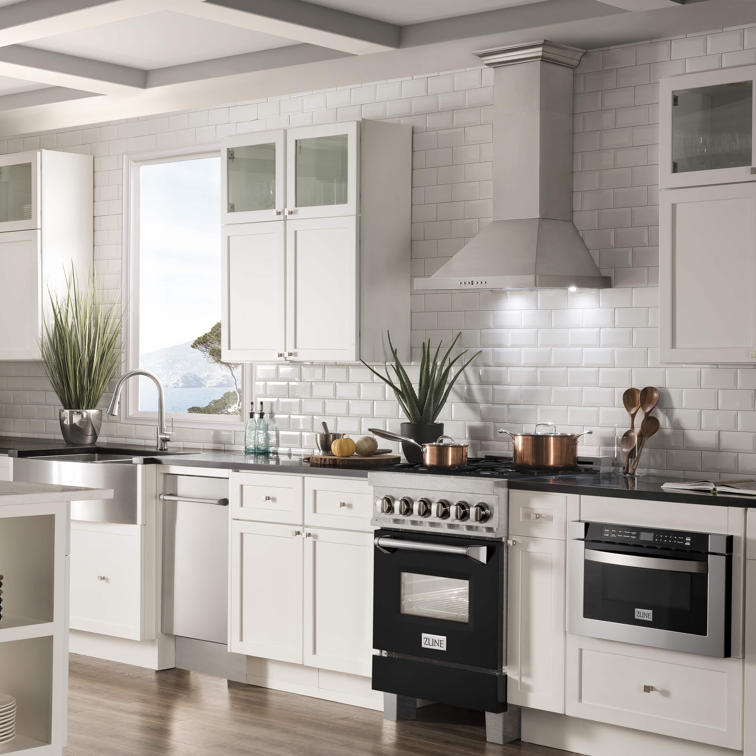 Satin stainless steel dual fuel range with black matte door and gas cooktop burners