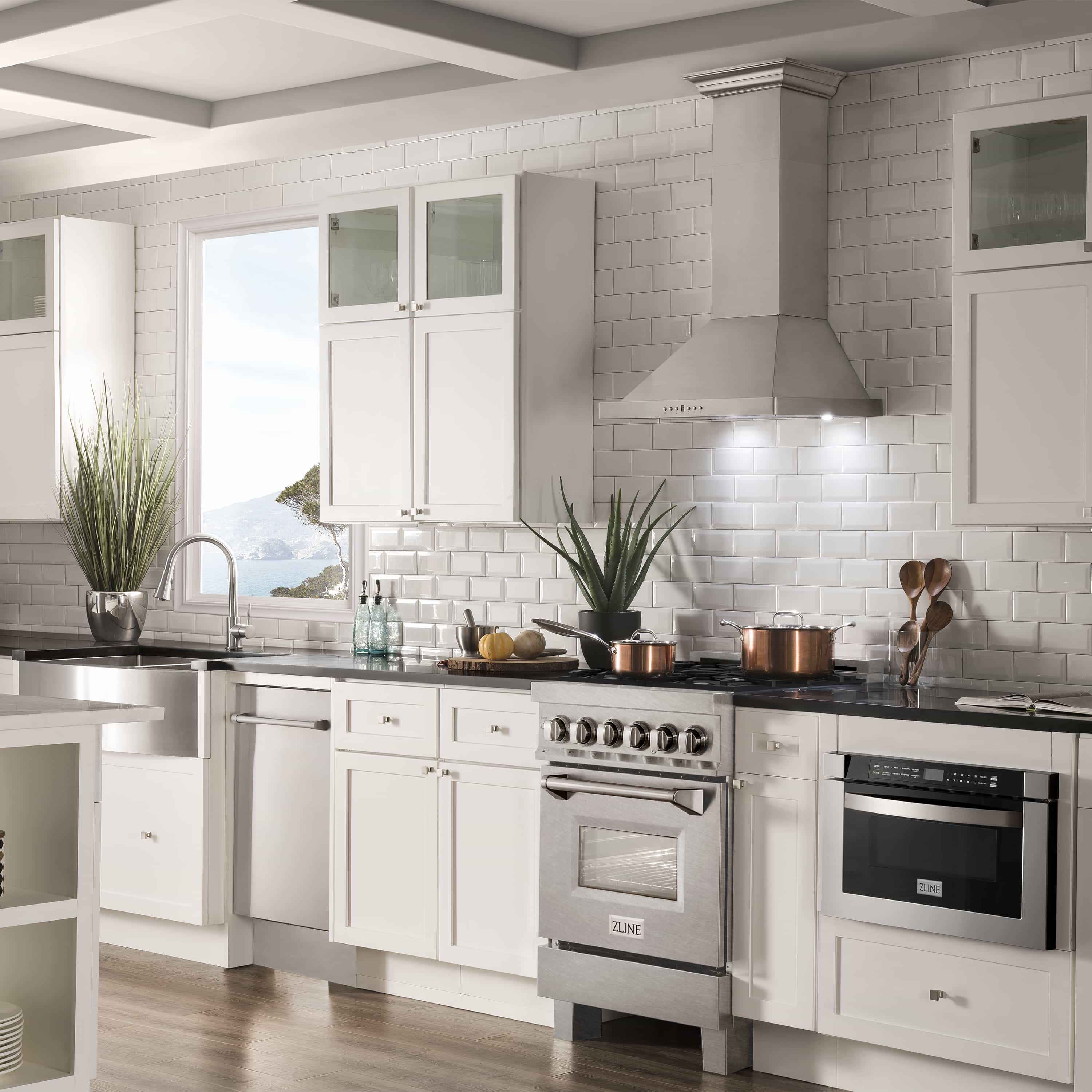 Dual fuel range in a modern kitchen with stainless front and glass oven door