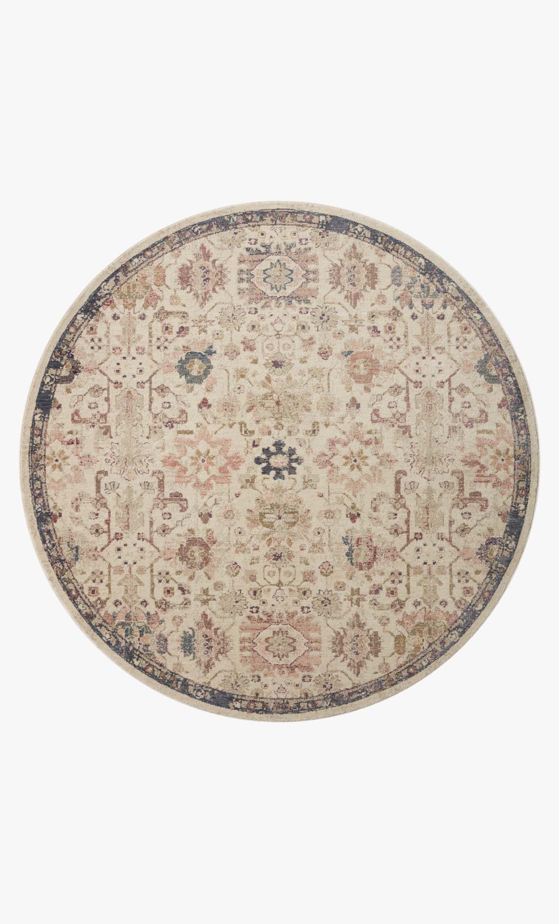 Round ivory rug with ornate traditional motifs and dark blue outer border