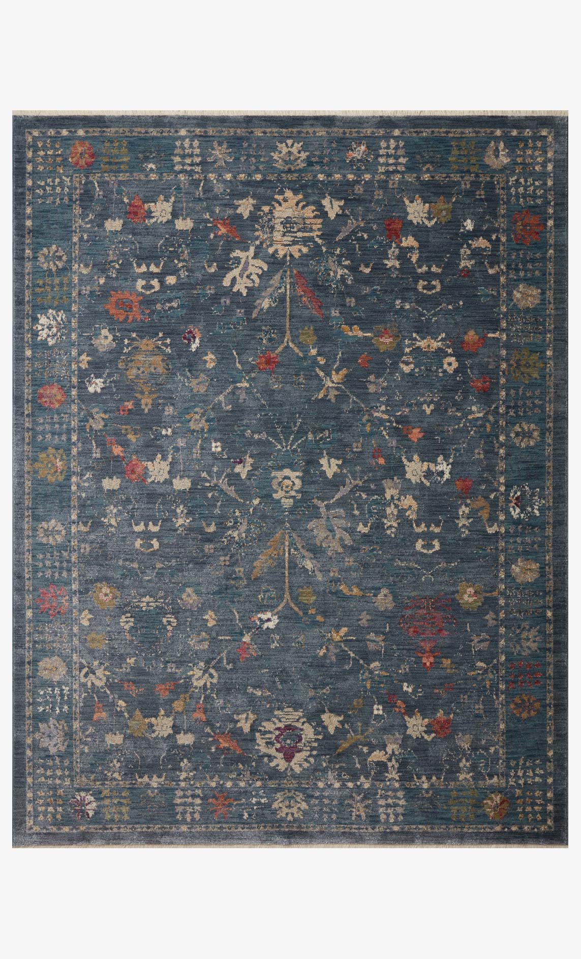 Denim-blue traditional power-loomed rug with ornate multicolor pattern and border