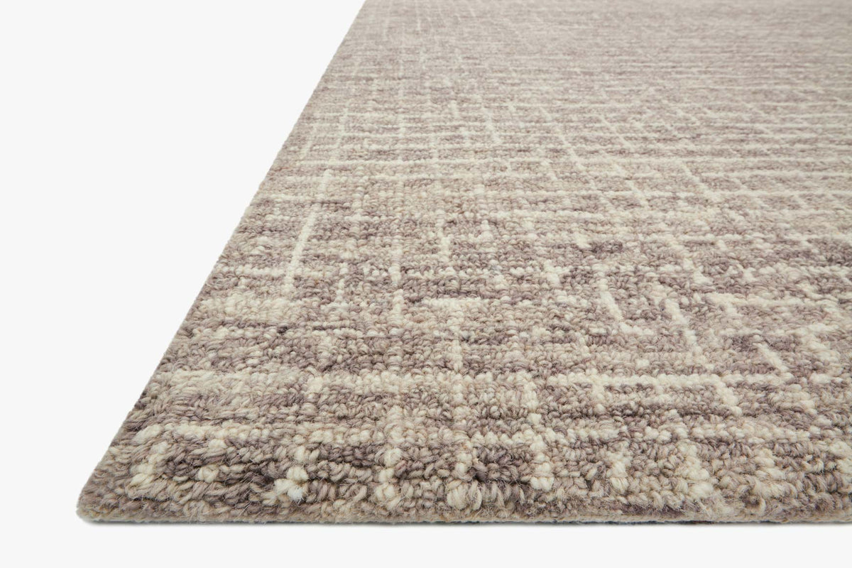 Transitional hooked rug in smoke, close-up corner with dense loop texture