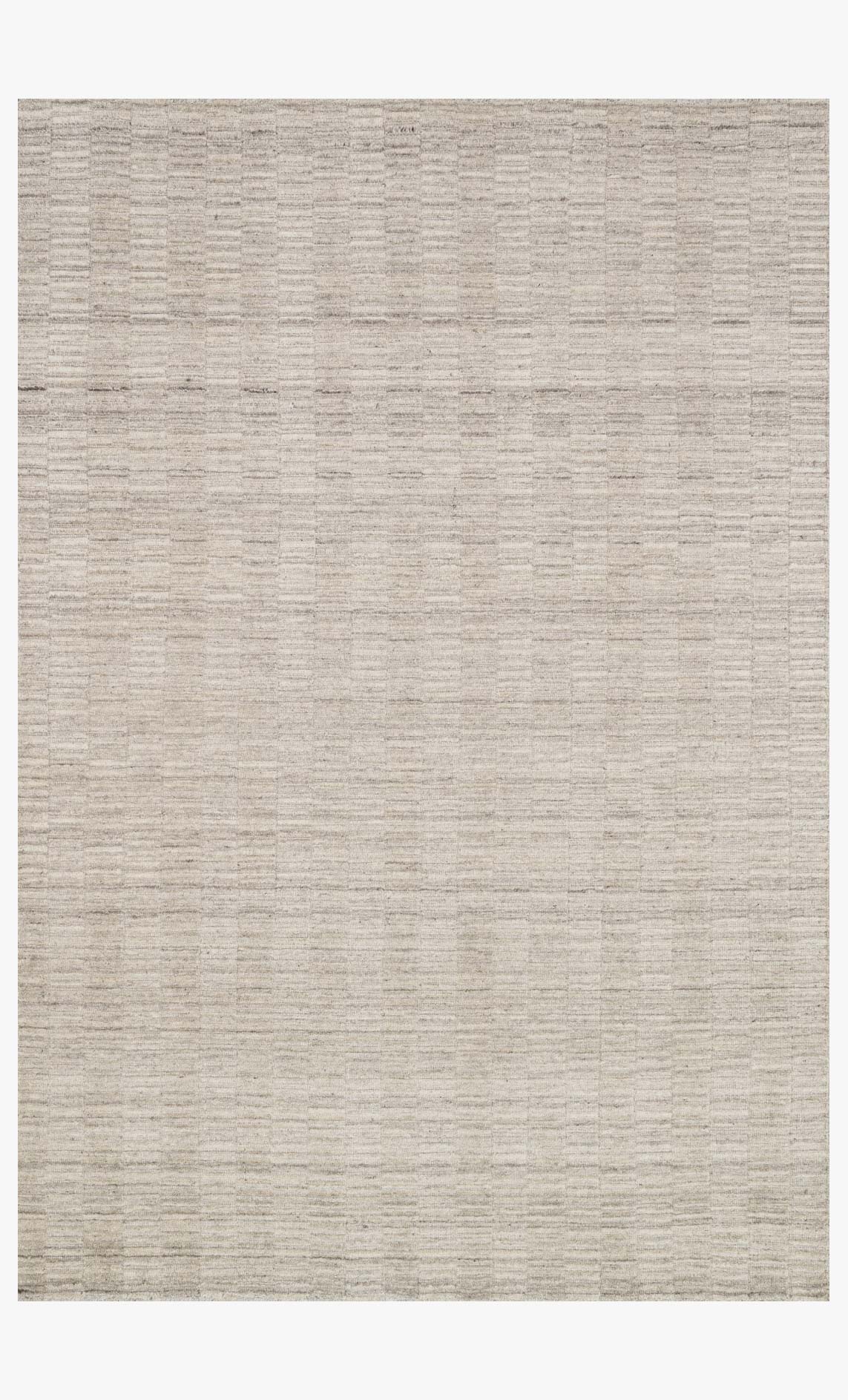 Hand-loomed oatmeal rug with subtle grid texture